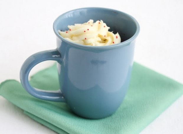 Red Velvet Mug Cake frosted with cream cheese frosting