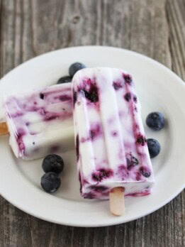 photo of blueberry popsicles on a plate
