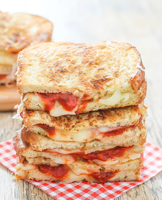 a close-up of pizza grilled cheese sandwiches