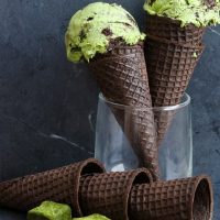 photo of matcha cookies and cream ice cream cones