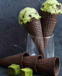 photo of matcha cookies and cream ice cream cones