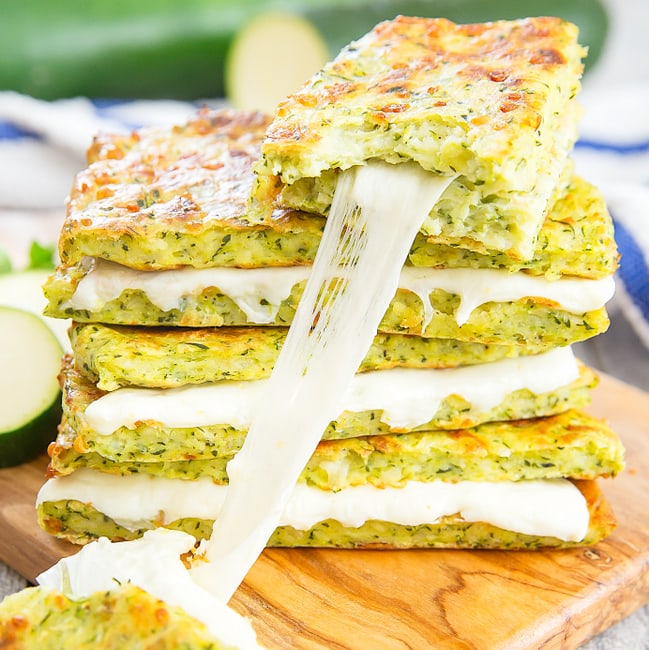 Stack of Zucchini Grilled Cheese Sandwiches with cheese pull