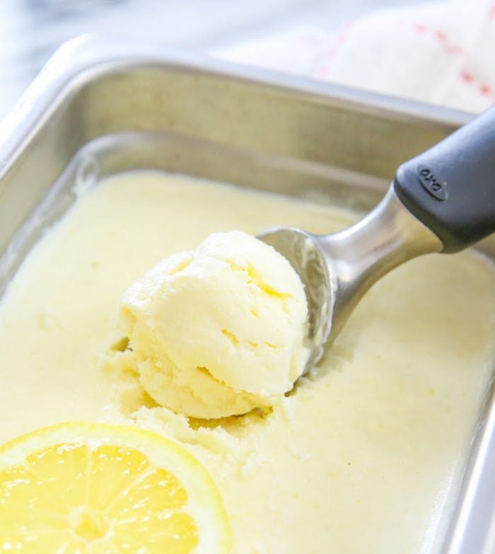 photo of whole lemon ice cream with an ice cream scoop
