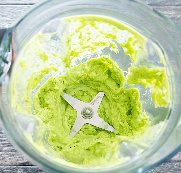 overhead photo of avocado puree in a blender