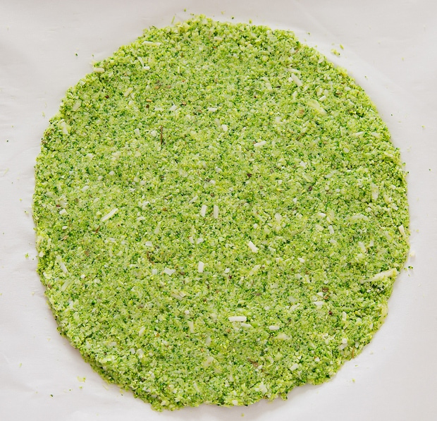 overhead shot of broccoli crust ready for toppings