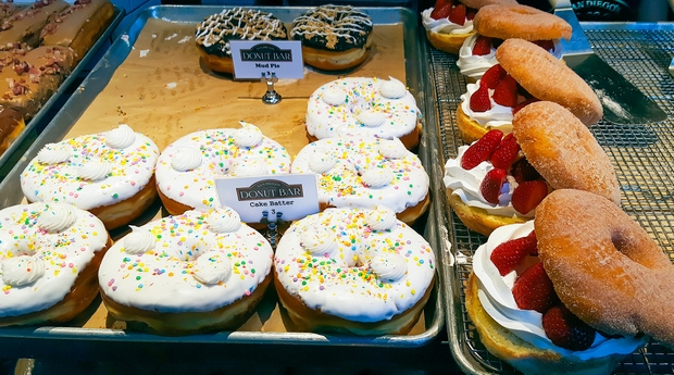 photo of cake batter donuts on a tray at Donut Bar
