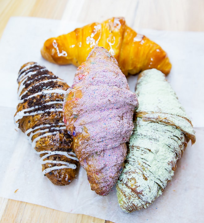 overhead photo of different kinds of croissants