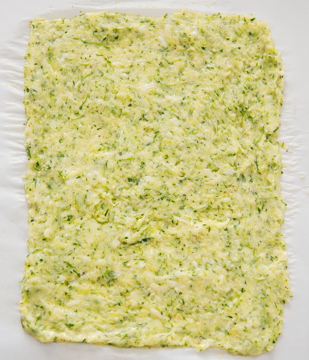 process photo showing the zucchini mixture spread out into an even layer