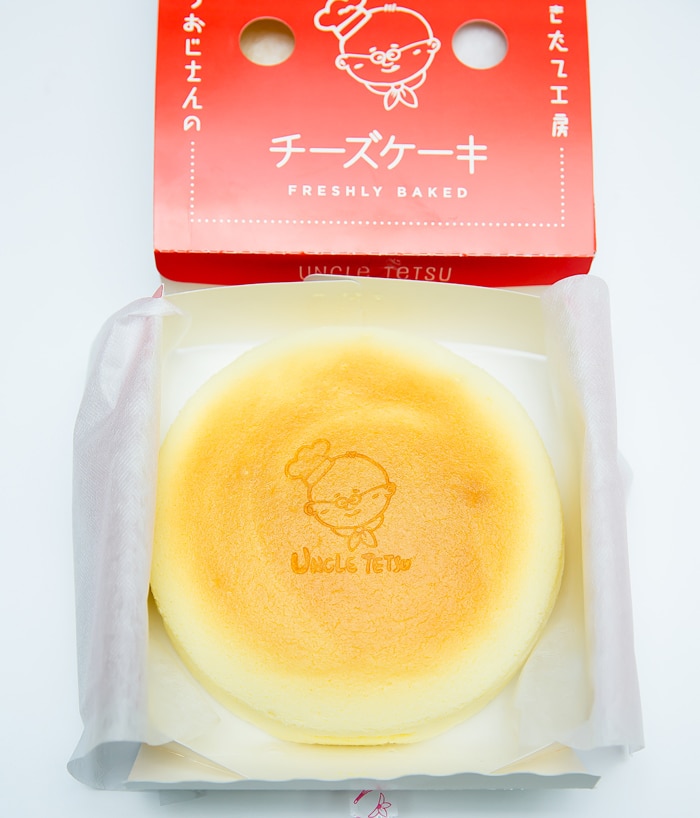 overhead photo of an Uncle Tetsu Japanese Cheesecake in a box