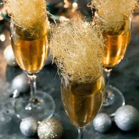 Champagne Cocktails with gold spun sugar