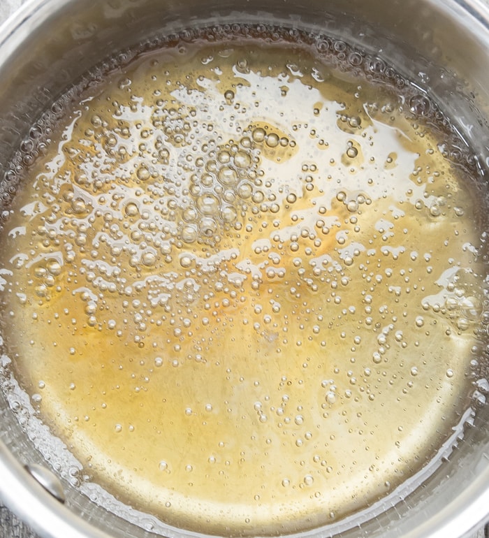 photo of sugar mixture boiling in a pot