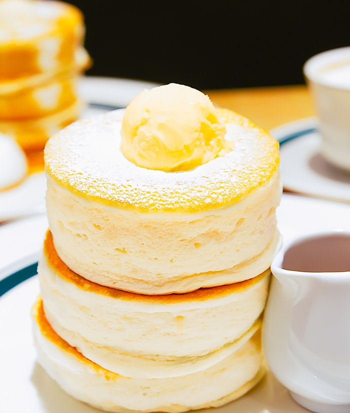 close-up photo of a stack of souffle pancakes