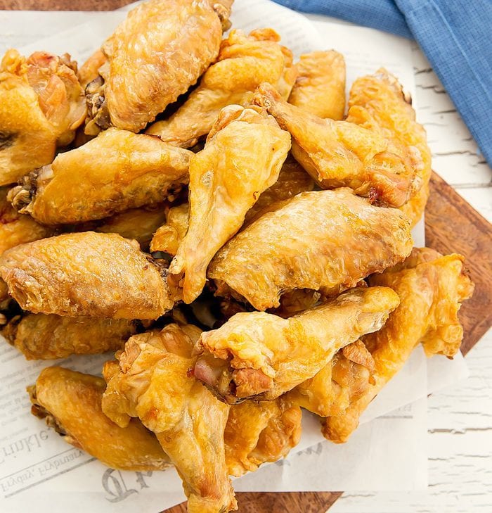 overhead photo of a pile of Crispy Baked Chicken Wings