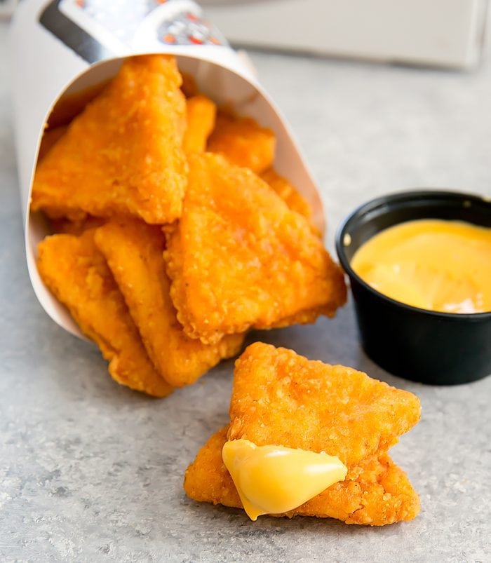 close-up photo  of Taco Bell's Naked Chicken Chips with Nacho Cheese