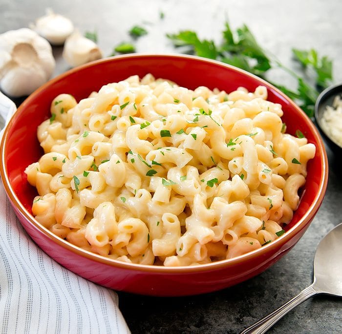 Instant Pot Garlic Parmesan Macaroni and Cheese in a red bowl