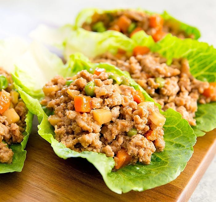 a close-up of a chinese lettuce wrap