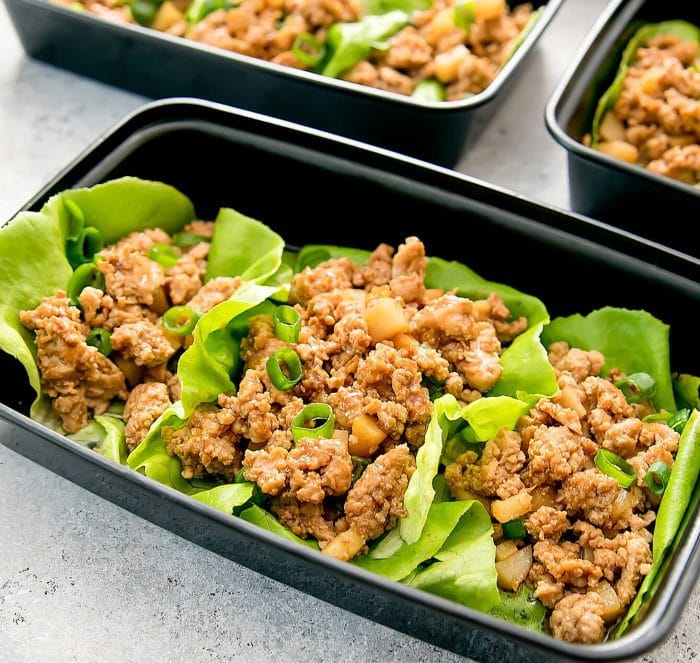 photo of three Chicken Lettuce Wraps in a meal prep container