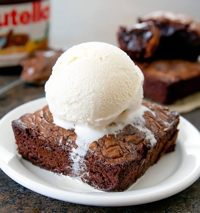 photo of Nutella Brownie for One topped with vanilla ice cream