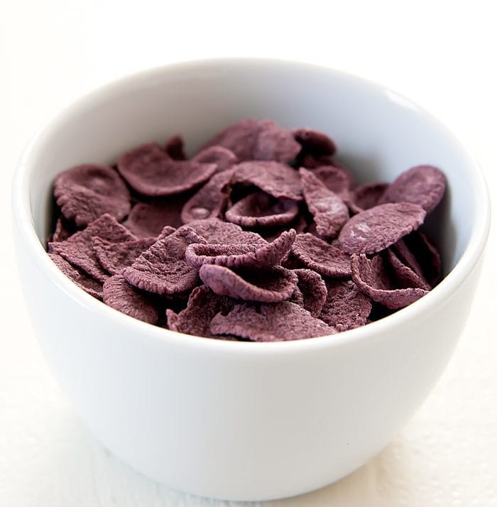 close-up photo of Organic Purple Maize Flakes in a bowl