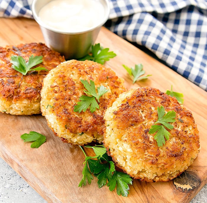 photo of Cauliflower "Crab" Cakes on a wooden board