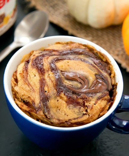 photo of of a nutella swirl pumpkin mug cake