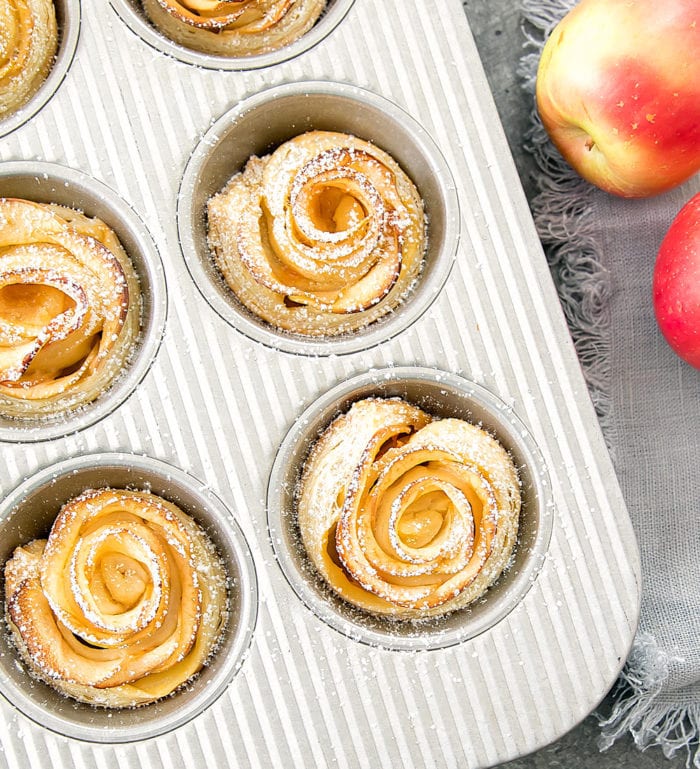 overhead photo of Apple Rose Tarts in a muffin tin