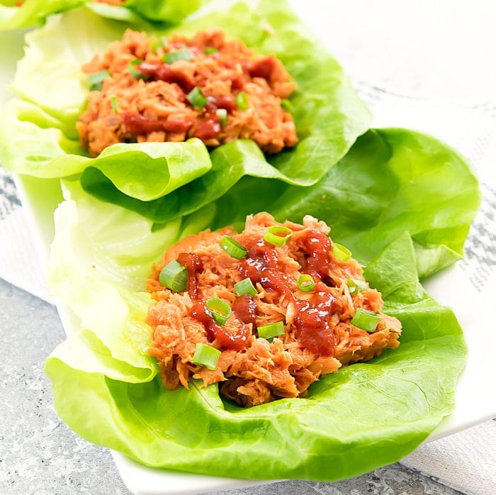 close-up of Tuna Lettuce Wraps with sriracha