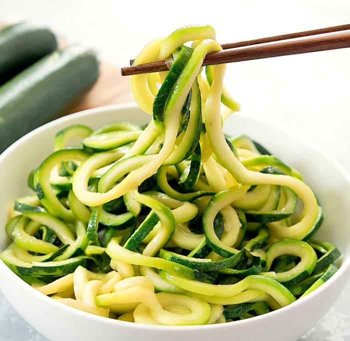 photos of chopsticks grabbing Garlic Zucchini Noodles