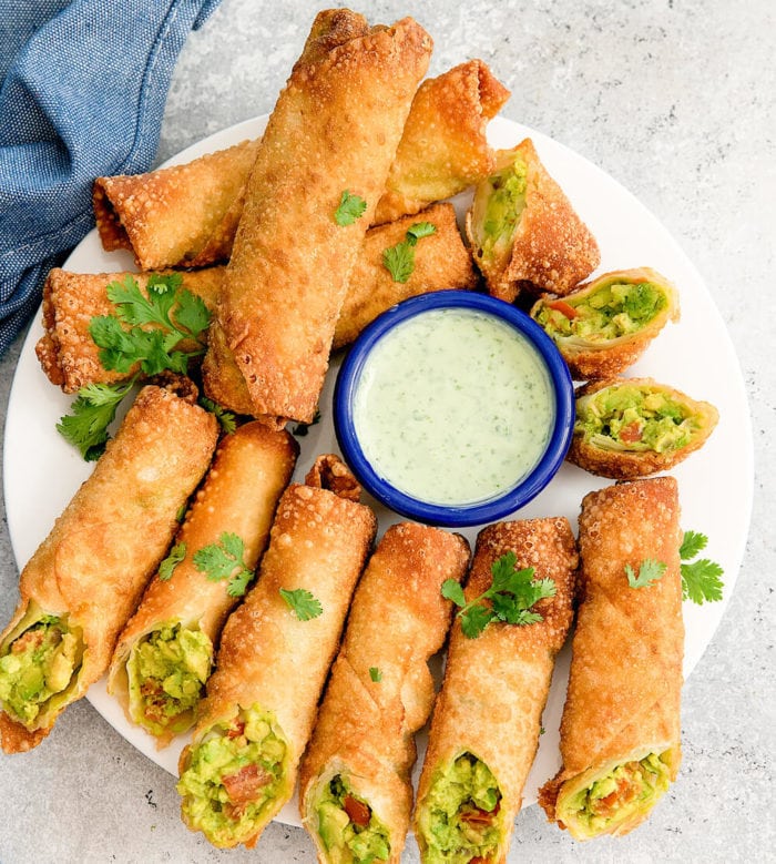 overhead view of plate of avocado egg rolls