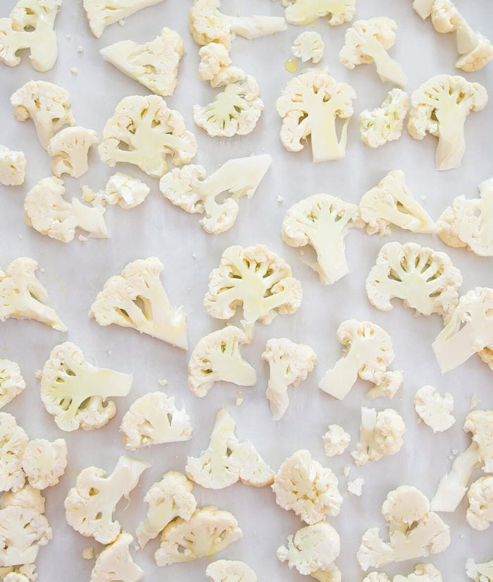 process photo showing sliced cauliflower florets before they are cooked