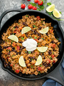 Overhead view of skillet filled with taco cauliflower rice