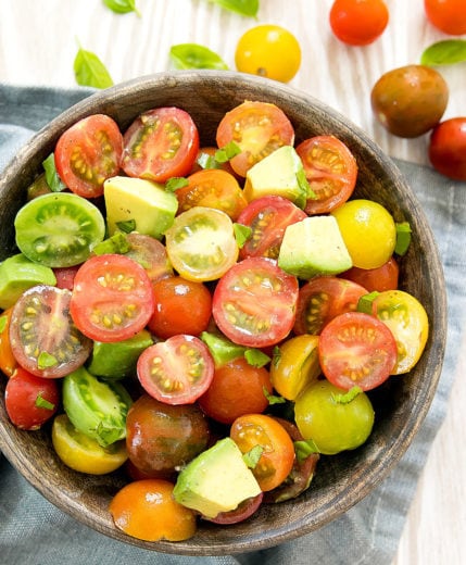 overhead photo of a bowl of tomato avocado salad