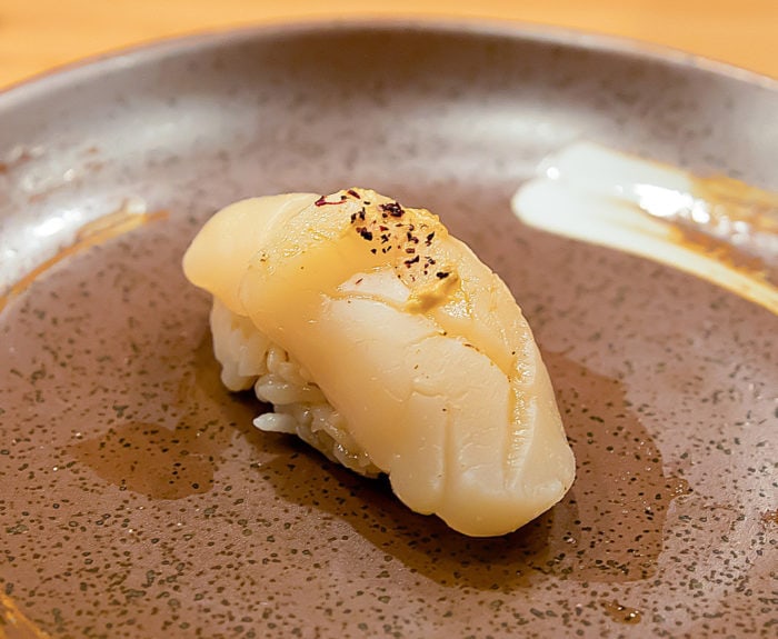 photo of seared scallop, mustard, plum salt