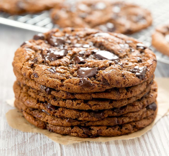 Stack of paleo chocolate chip cookies with more cookies in background