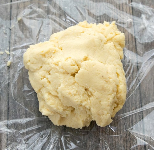 photo of the dough on a piece of plastic wrap