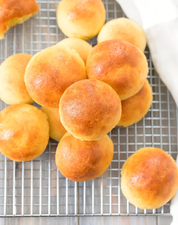 overhead photo of keto bread rolls on a baking rack