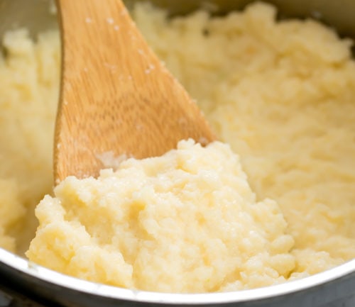 close-up photo of cauliflower grits in a pan