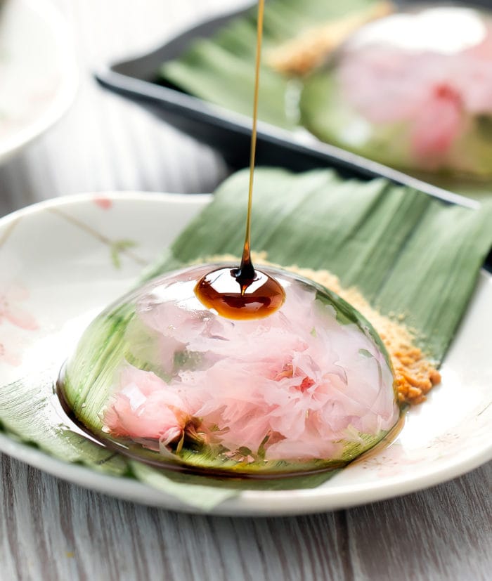 photo of syrup being poured over a cherry blossom raindrop cake