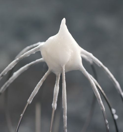 close-up photo of egg whites on a whisk
