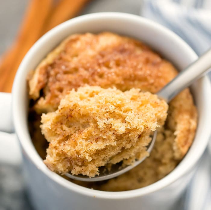 overhead photo of a spoon scooping some snickerdoodle mug cake