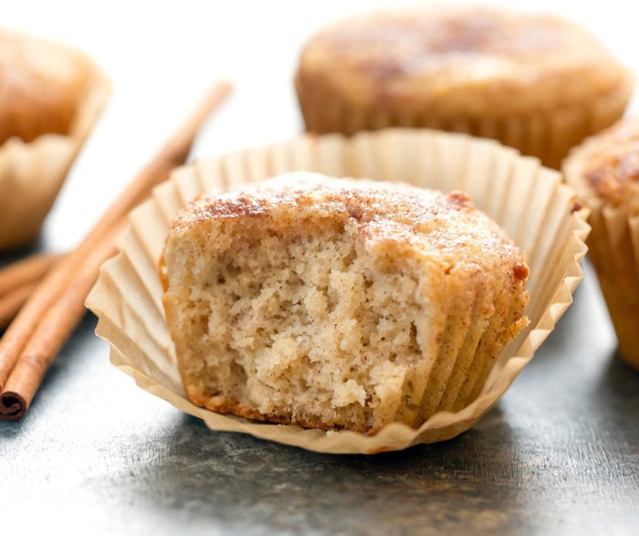 close-up photo of a snickerdoodle muffin with a bite taken out of it
