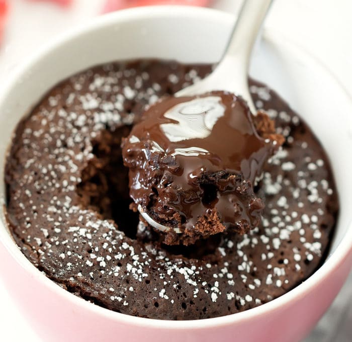 close-up photo of a spoonful of chocolate lava cake