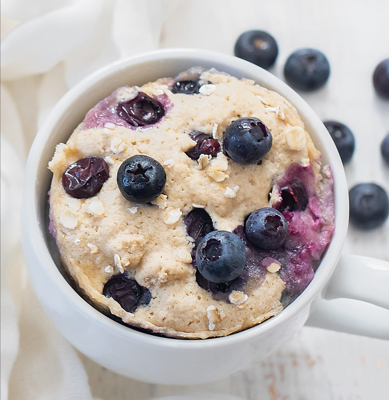 Healthy Vanilla Blueberry Mug Cake - Nourish Every Day
