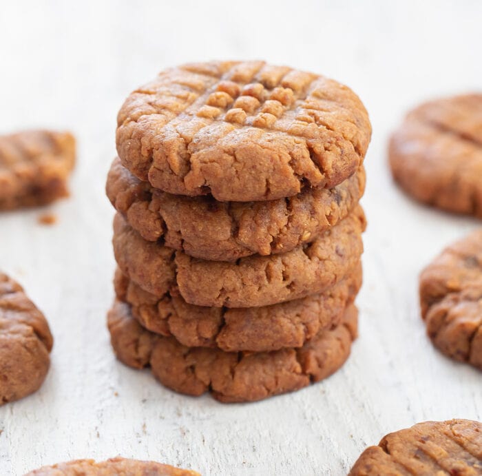 a stack of five peanut butter cookies.