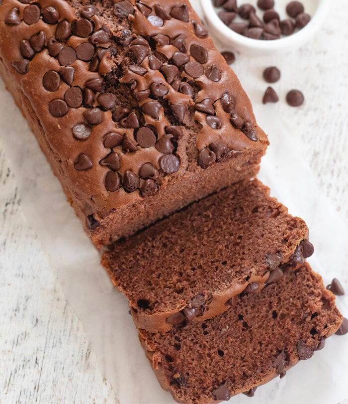 a loaf of chocolate bread topped with chocolate chips.
