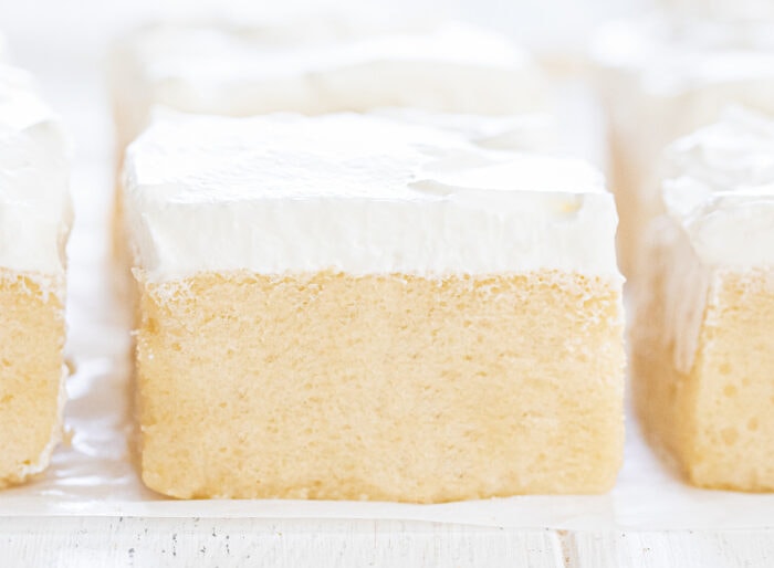 a slice of frosted cloud cake.