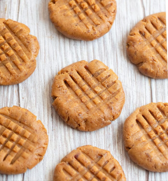 healthy no bake peanut butter cookies lined up.