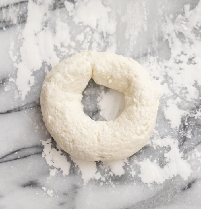 dough formed into a donut shape.