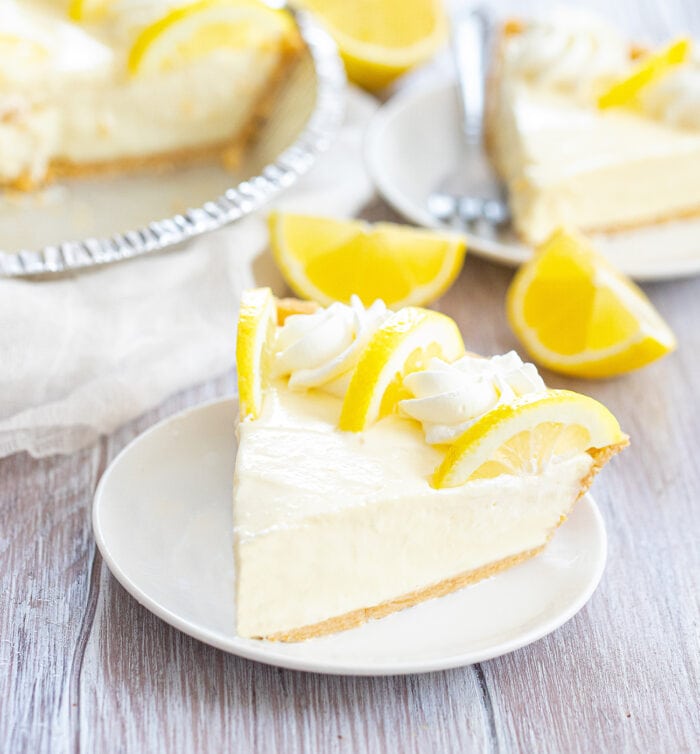 a slice of lemon pie on a plate.