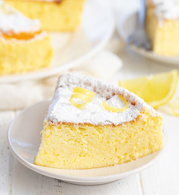 a slice of lemon cheesecake on a plate.